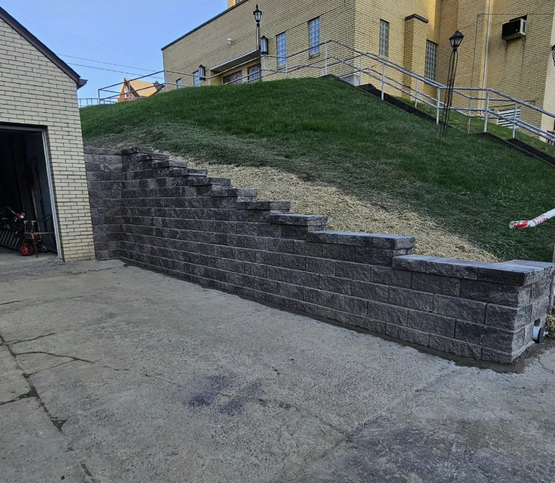 New block retaining wall built by Boso's Lawn Care