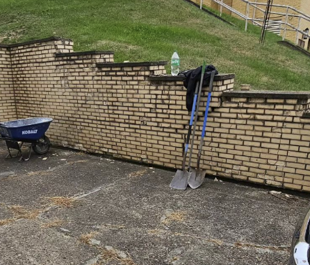 Old failing retaining wall before replacement
